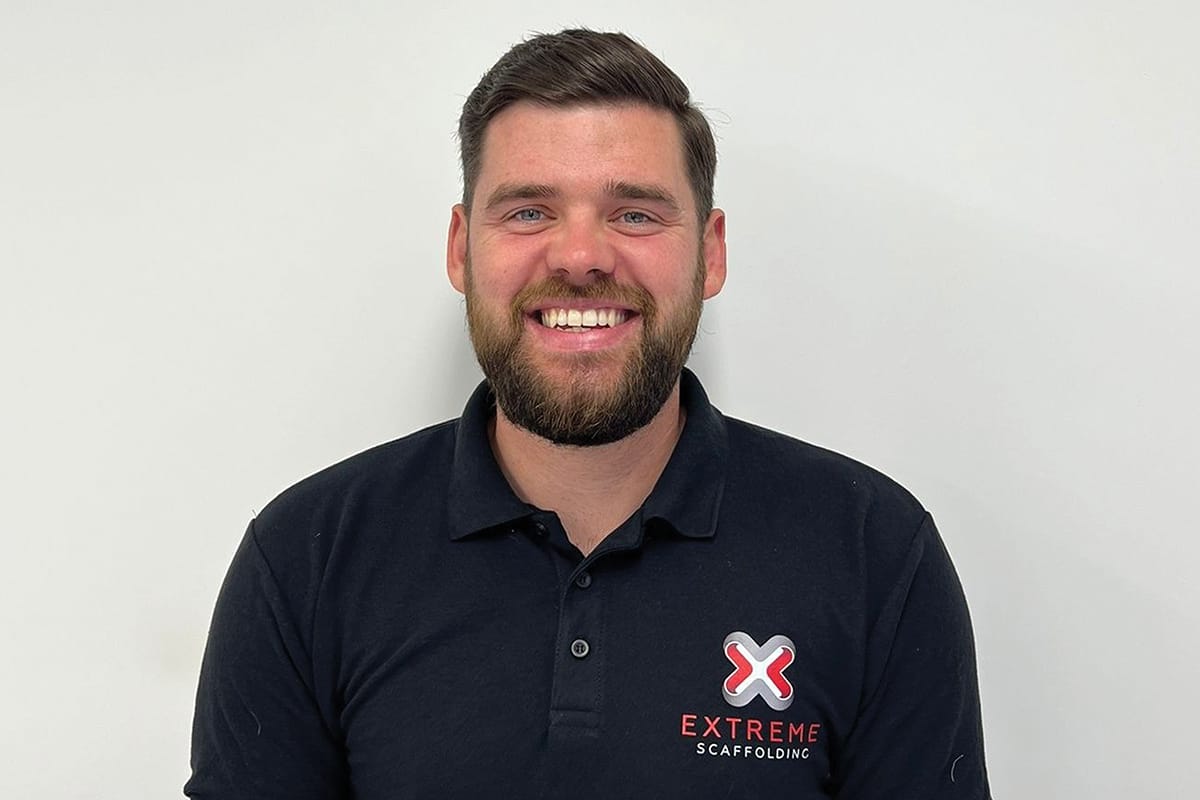 Smiling man in Extreme Scaffolding polo shirt