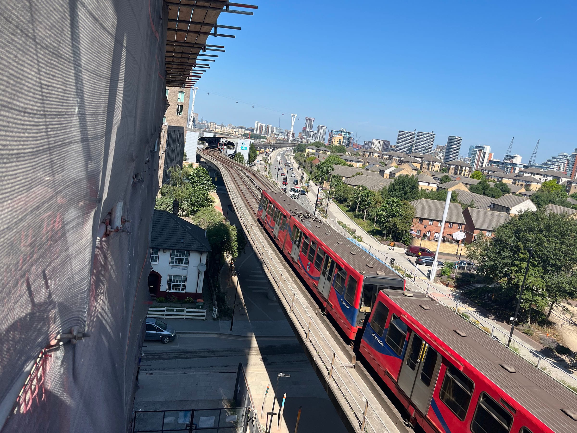DLR train on elevated tracks in London Docklands